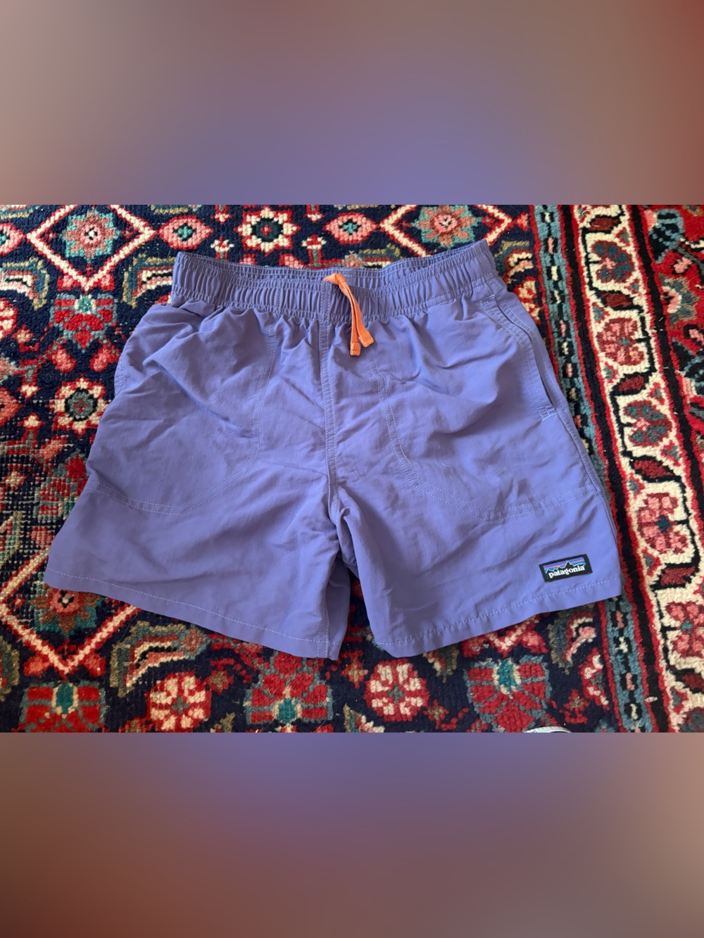 Patagonia size L/12 Purple Shorts with Orange Drawcord and Black Lining